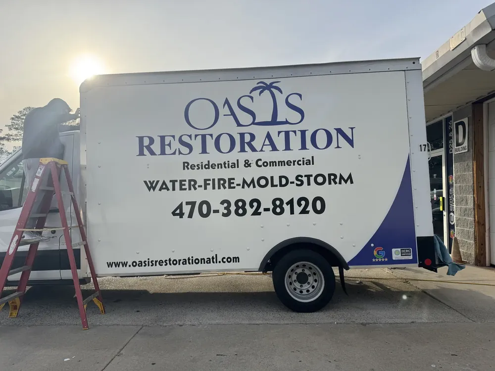 Oasis Restoration box truck with printed side graphics
